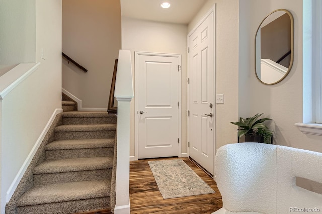 504 E Dry Creek Pl, Littleton, CO 80122 - foyer entrance with wood finished floors, recessed lighting, baseboards, and stairway