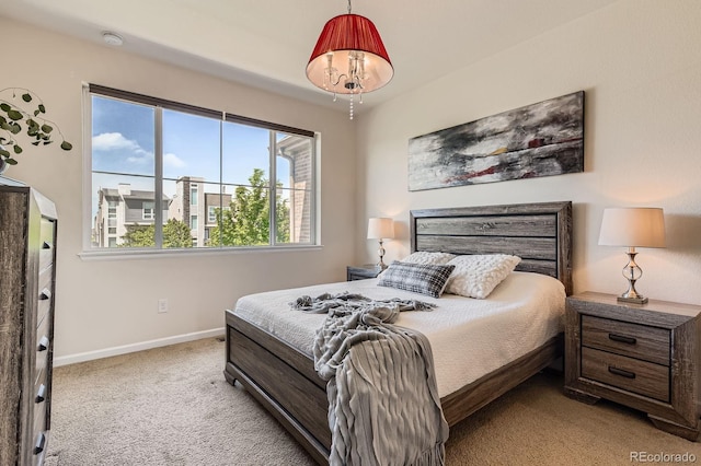504 E Dry Creek Pl, Littleton, CO 80122 - bedroom featuring light colored carpet and baseboards