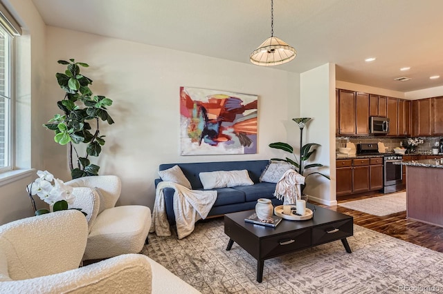 504 E Dry Creek Pl, Littleton, CO 80122 - living room featuring light wood-style floors and recessed lighting
