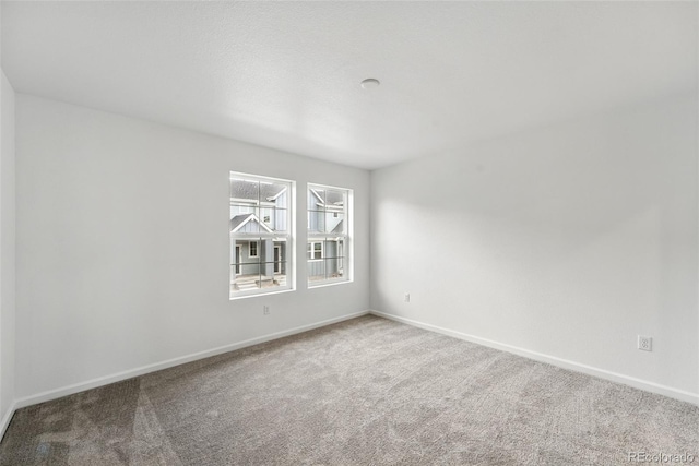 17117 W 91st Ln, Arvada, CO 80007 - carpeted empty room featuring baseboards