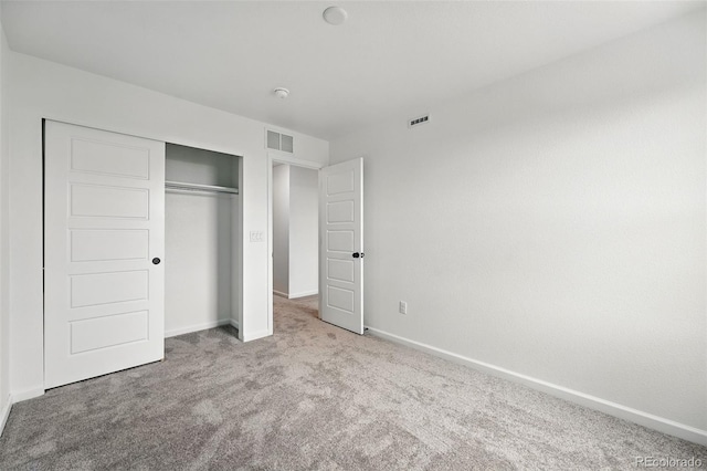 17117 W 91st Ln, Arvada, CO 80007 - unfurnished bedroom with carpet flooring, a closet, and baseboards