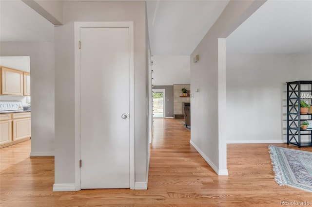 445 Wintery Cir, Colorado Springs, CO 80919 - hallway with light wood finished floors and baseboards
