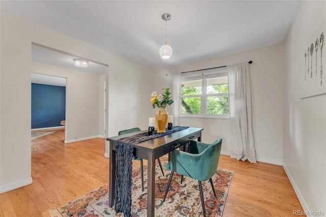 445 Wintery Cir, Colorado Springs, CO 80919 - dining area featuring light wood finished floors and baseboards