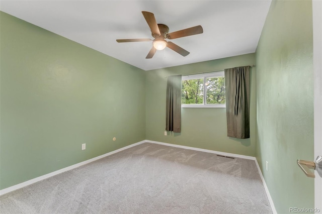 445 Wintery Cir, Colorado Springs, CO 80919 - spare room with baseboards, carpet floors, and a ceiling fan