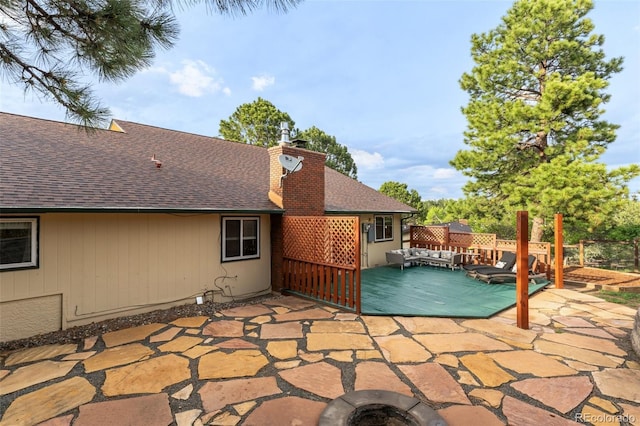 445 Wintery Cir, Colorado Springs, CO 80919 - view of pool featuring a patio area and an outdoor living space with a fire pit