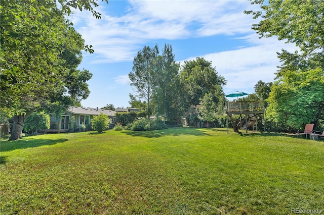 1315 Tipperary St, Boulder, CO 80303 - view of grassy yard featuring stairway and a deck
