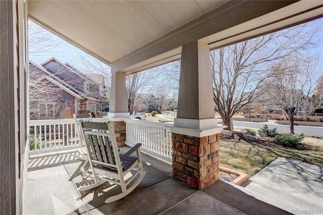 view of patio featuring a porch