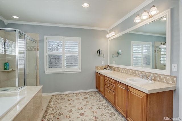 full bathroom featuring ornamental molding, a stall shower, and a sink