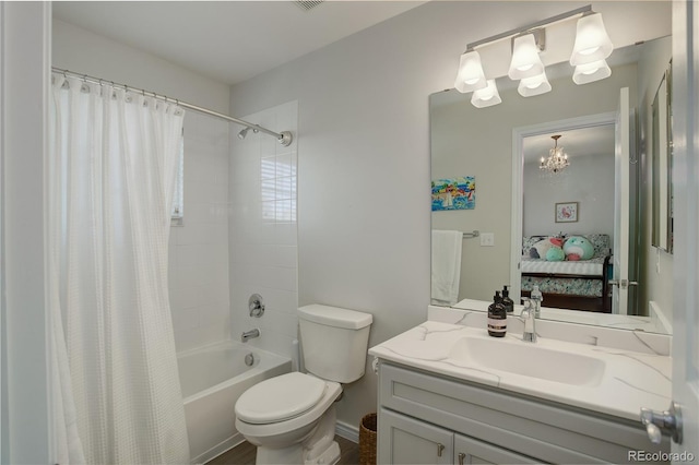 ensuite bathroom featuring vanity, shower / tub combo, connected bathroom, and toilet