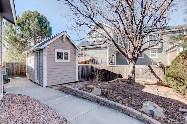 view of shed featuring a fenced backyard