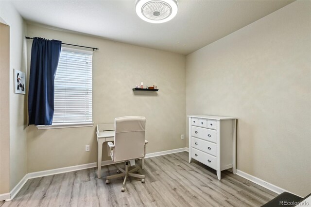 13113 W 73rd Ave, Arvada, CO 80005 - home office featuring baseboards and wood finished floors