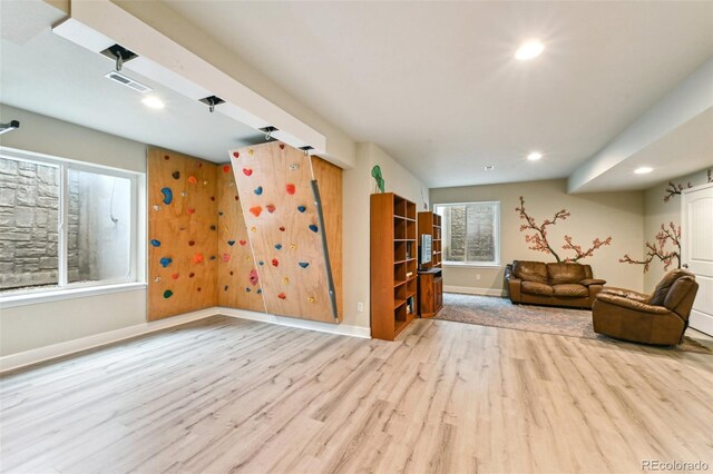 13113 W 73rd Ave, Arvada, CO 80005 - living area featuring baseboards, wood finished floors, visible vents, and recessed lighting
