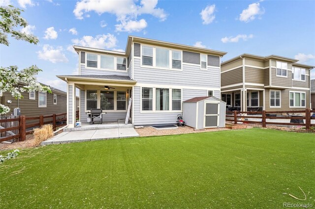 13113 W 73rd Ave, Arvada, CO 80005 - rear view of house featuring a patio area, a shed, a fenced backyard, and a ceiling fan