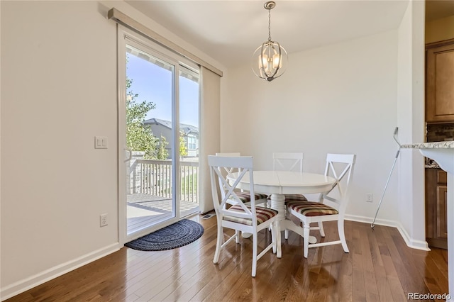 dining space with a notable chandelier and dark wood-type flooring