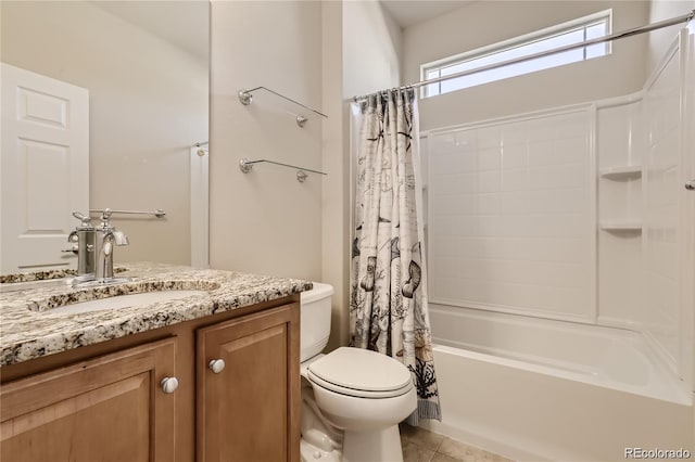 full bathroom featuring vanity, tile patterned flooring, toilet, and shower / bath combo