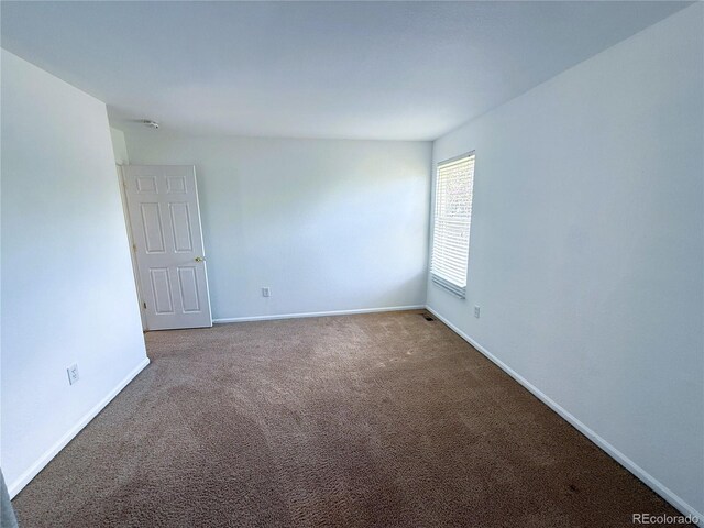 20401 E Chenango Pl, Aurora, CO 80015 - empty room with carpet flooring and baseboards