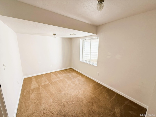 20401 E Chenango Pl, Aurora, CO 80015 - empty room with light colored carpet and a textured ceiling