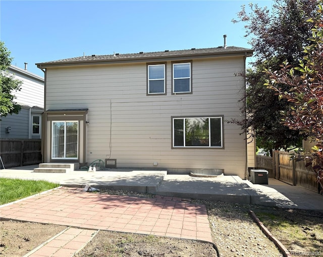 20401 E Chenango Pl, Aurora, CO 80015 - back of property featuring a patio and a fenced backyard