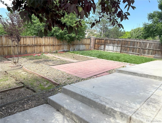 20401 E Chenango Pl, Aurora, CO 80015 - fenced backyard with a patio