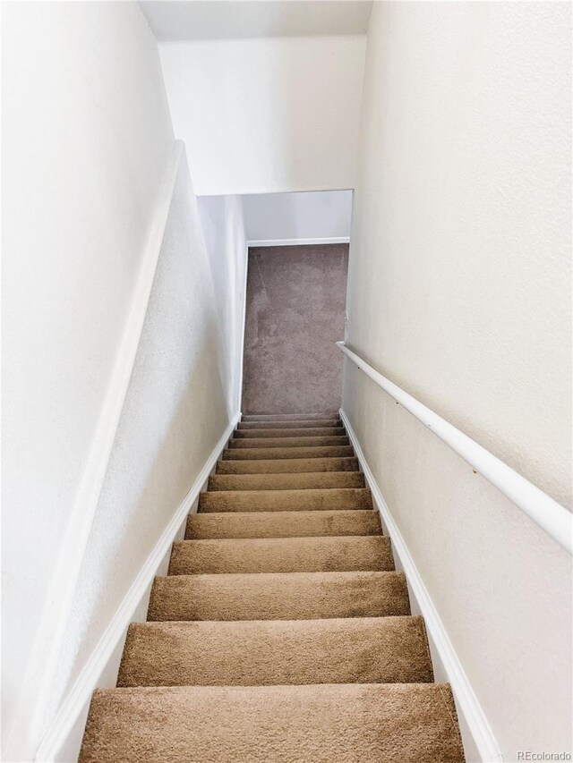 20401 E Chenango Pl, Aurora, CO 80015 - stairs with carpet floors and baseboards