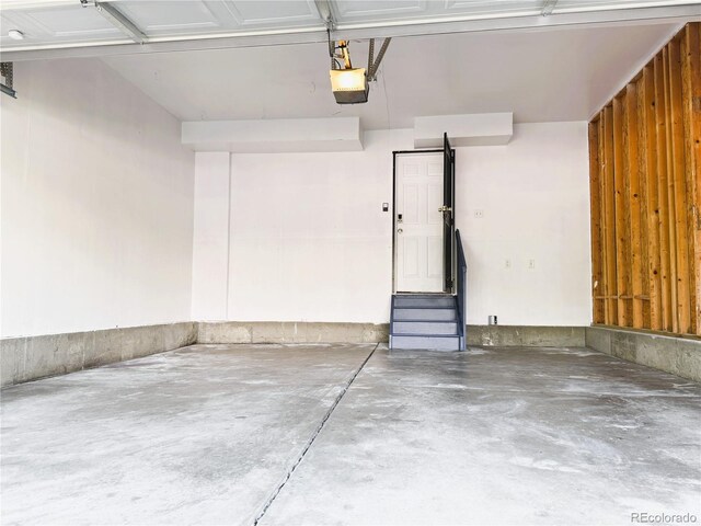 20401 E Chenango Pl, Aurora, CO 80015 - garage featuring a garage door opener