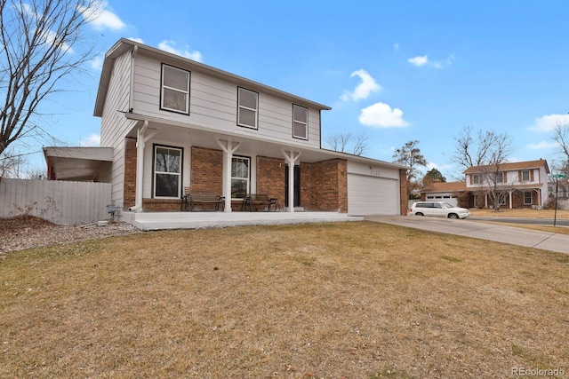 traditional-style home with brick siding, a porch, concrete driveway, an attached garage, and a front lawn