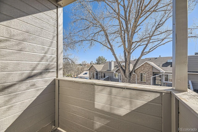 balcony featuring a residential view