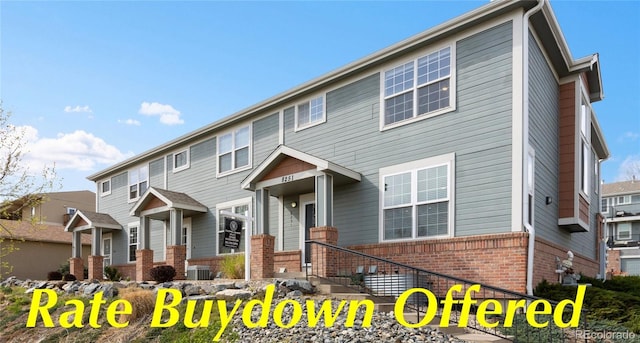 8251 W 54th Ave Unit 4, Arvada, CO 80002 - view of front of home featuring brick siding