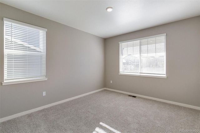 view of carpeted spare room