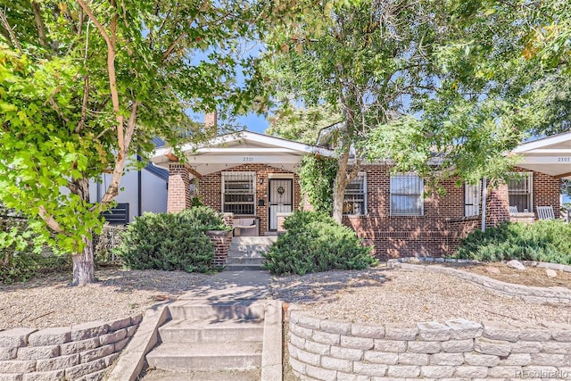 view of front of house with covered porch