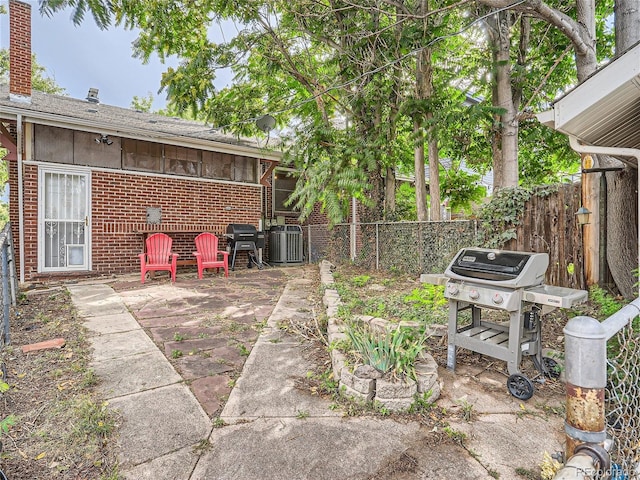 view of patio featuring area for grilling and central AC unit