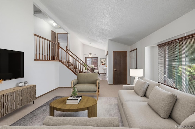 18083 E Atlantic Dr, Aurora, CO 80013 - living area with vaulted ceiling, carpet flooring, healthy amount of natural light, a textured ceiling, and stairs