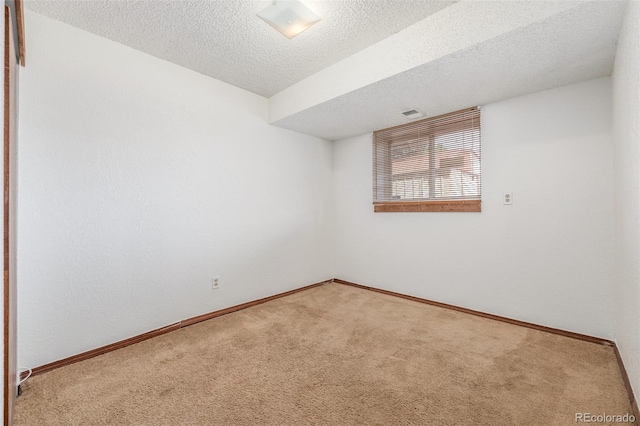18083 E Atlantic Dr, Aurora, CO 80013 - carpeted spare room with a textured ceiling and baseboards