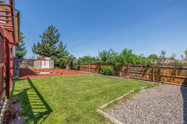 18083 E Atlantic Dr, Aurora, CO 80013 - fenced backyard with a storage unit
