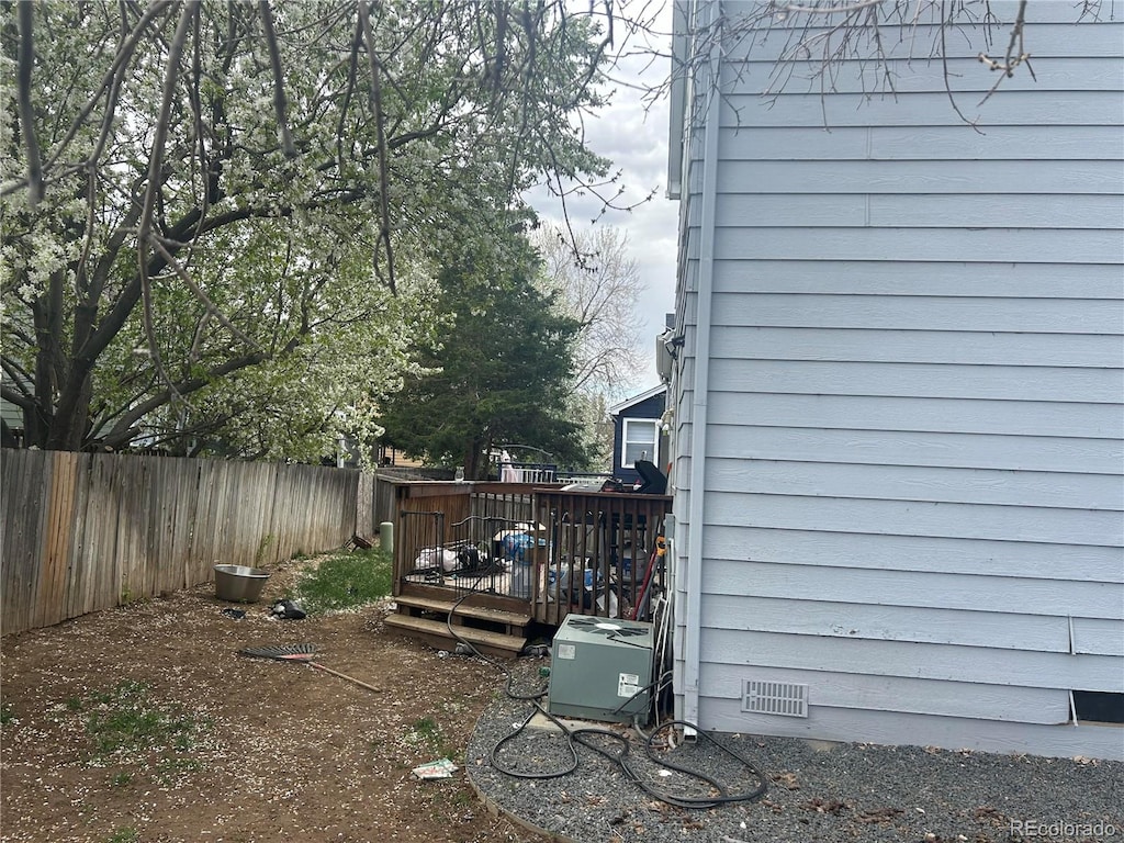 exterior space featuring a wooden deck