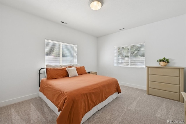 17912 Loverly Way, Monument, CO 80132 - carpeted bedroom featuring baseboards and visible vents