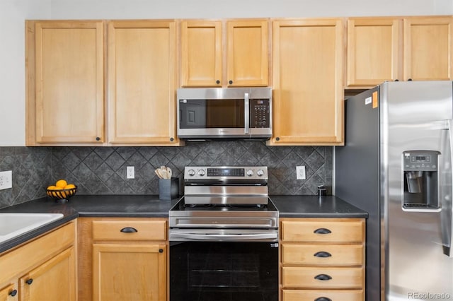 kitchen with backsplash, stainless steel appliances, and light brown cabinetry