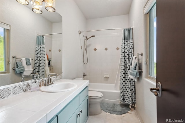 6338 Spotted Fawn Run, Littleton, CO 80125 - bathroom featuring vanity, tile patterned flooring, shower / tub combo with curtain, and a chandelier