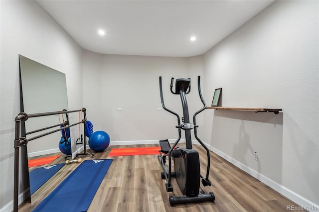 6338 Spotted Fawn Run, Littleton, CO 80125 - exercise room with wood finished floors and recessed lighting