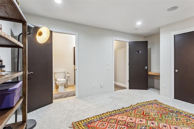 6338 Spotted Fawn Run, Littleton, CO 80125 - carpeted bedroom featuring recessed lighting and ensuite bath