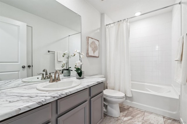 full bathroom featuring toilet, vanity, and shower / tub combo