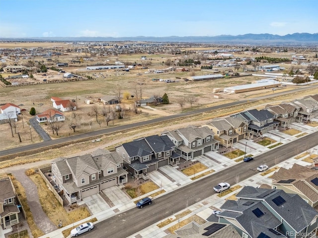 birds eye view of property with a residential view and a mountain view