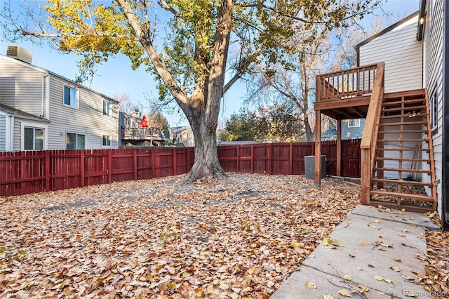 view of yard with a wooden deck