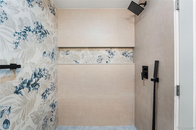 bathroom with tiled shower