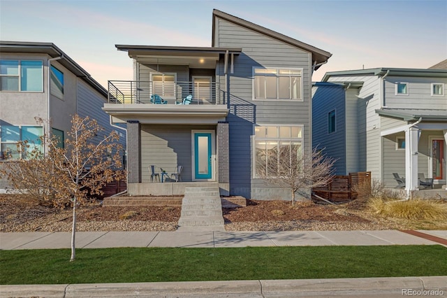 contemporary home featuring a balcony