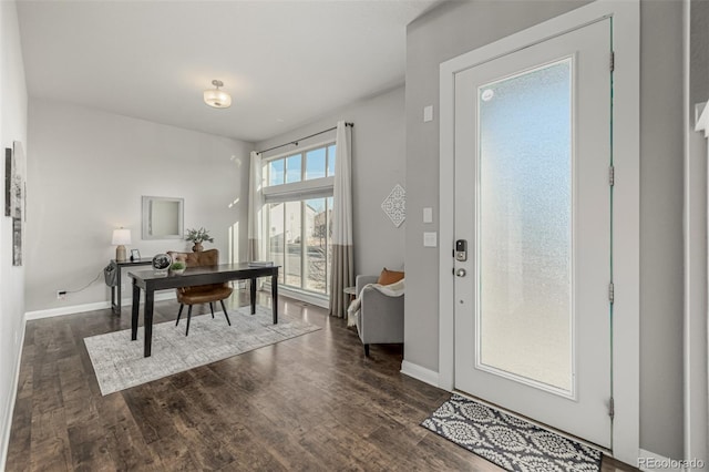 office featuring baseboards and dark wood-style flooring