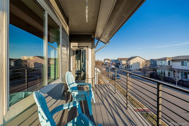 balcony featuring a residential view