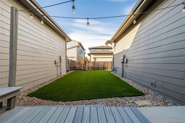 view of yard with fence