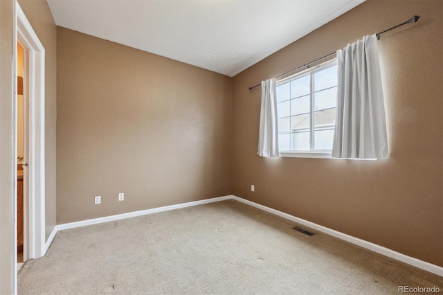 unfurnished room with carpet