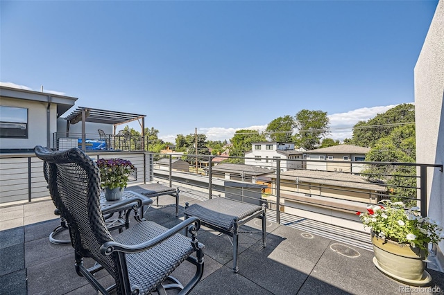 view of patio / terrace featuring a balcony